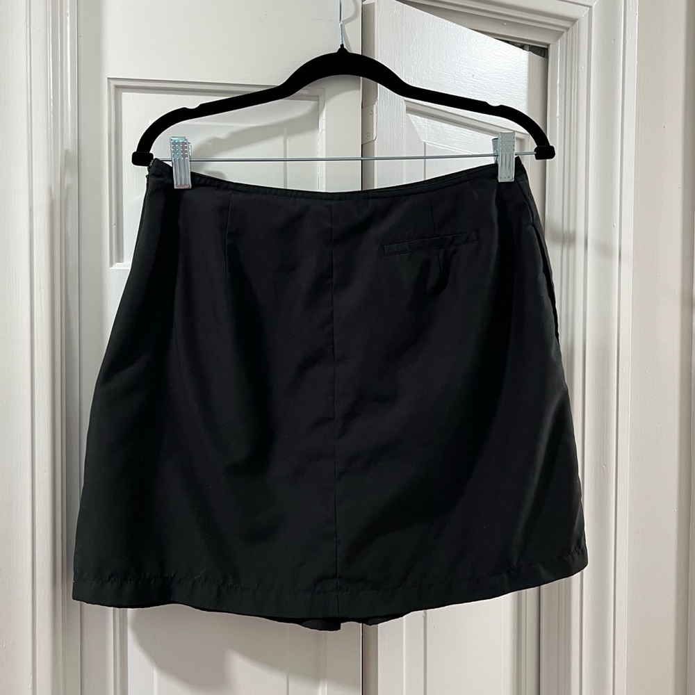 Izod Black Skort with Silver Button Accents - Picture 2 of 5